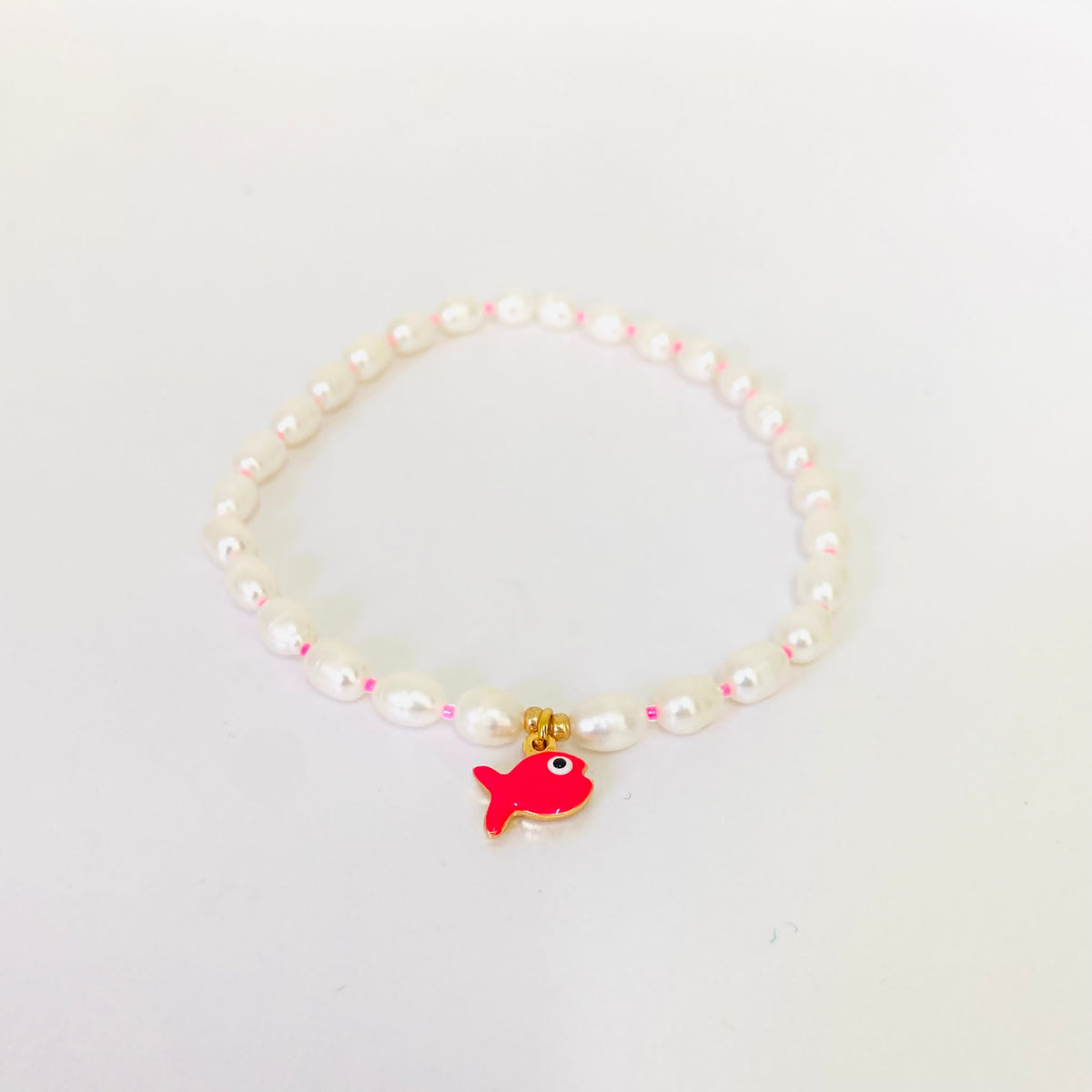 Collier de poisson rose