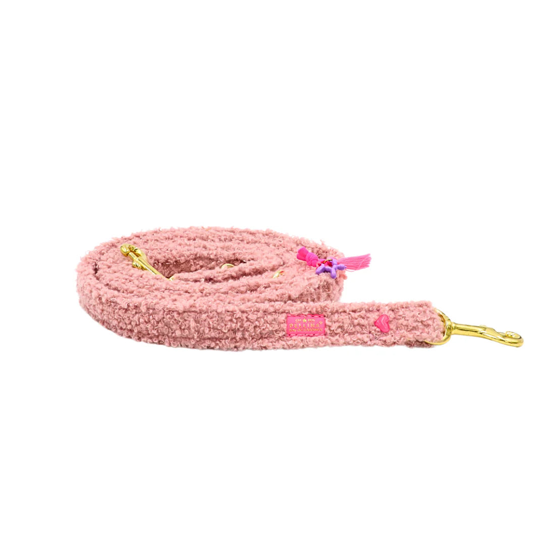 En peluche vieille leiband rose