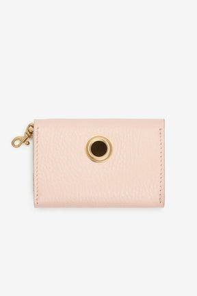 Porte-poche de merde pastel